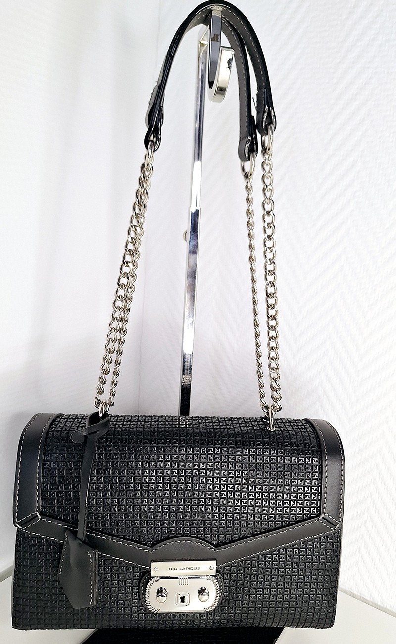 Black flap closure bag