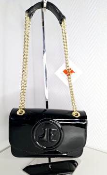 Black handbag with gold strap