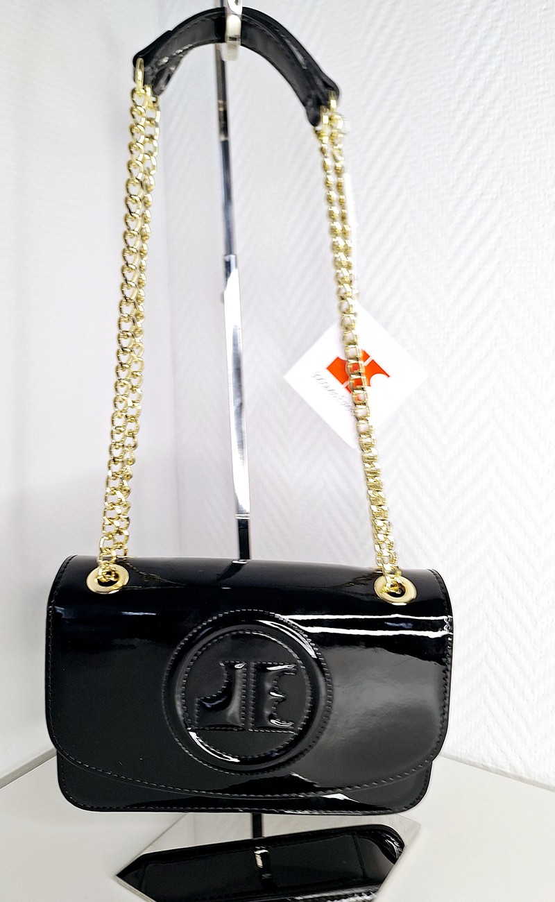 Black handbag with gold strap