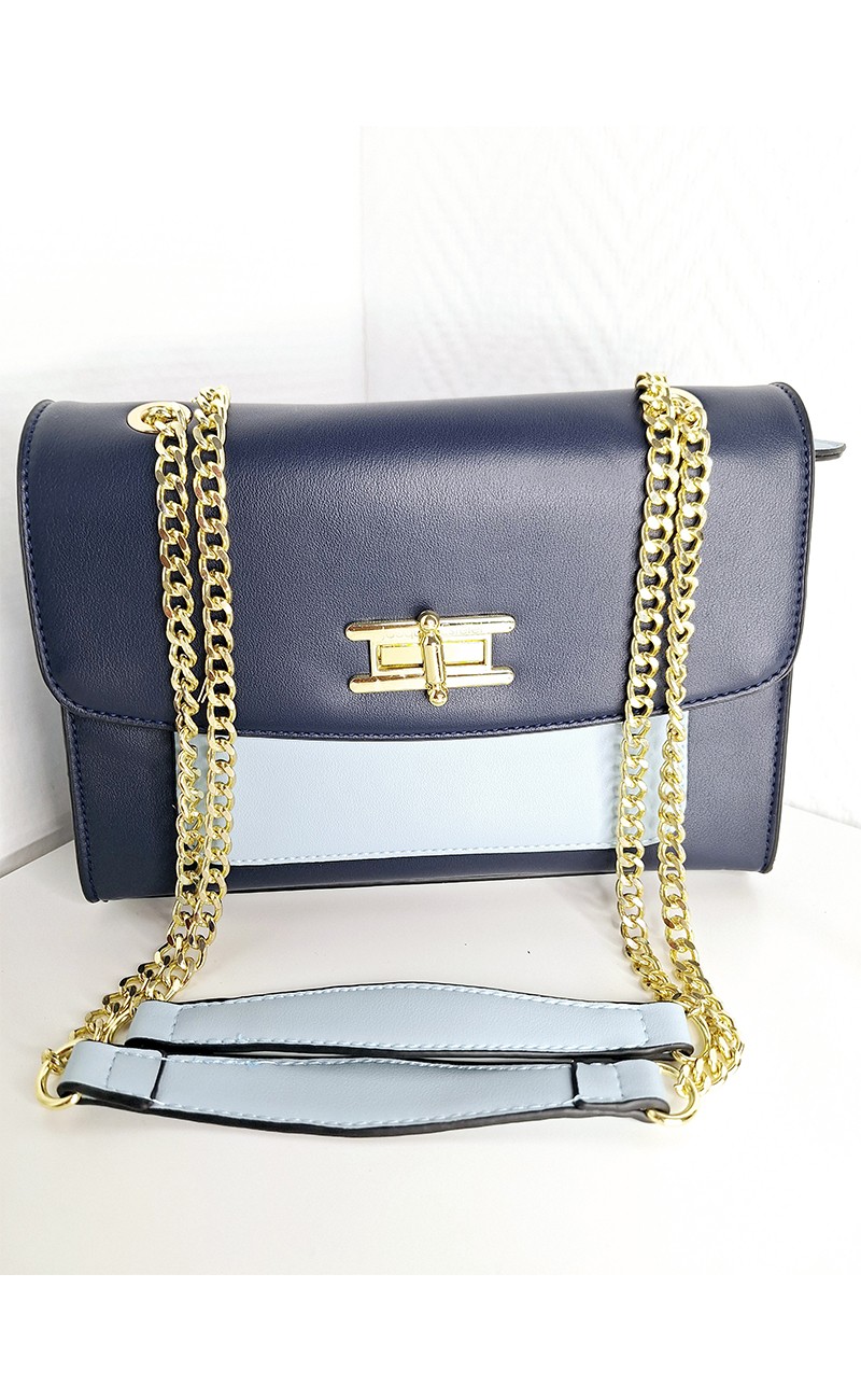 Navy blue handbag with gold shoulder strap