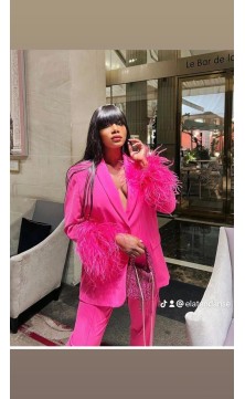 pink set trousers/jacket with feathers on the sleeves